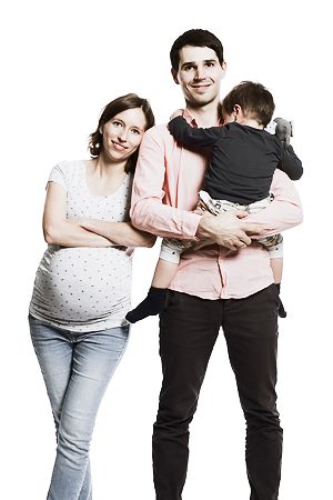 Familienfoto mit Babybauch